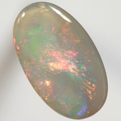 SOLID SEMI BLACK OPAL  Very bright fire, red and green. SEE VIDEO